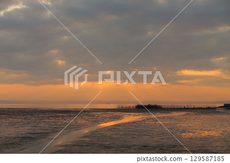 Arao City coast at dusk 129587185