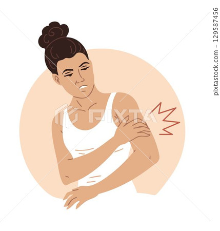 Woman holding shoulder in pain, rotator cuff injury 129587456