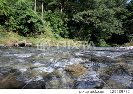 The clear waters of the Kanzaki River in Yamagata City 129589782