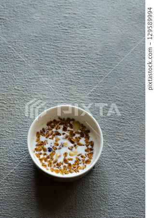 Granola with milk 129589994