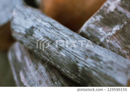 Pile of chopped fire wood prepared for winter 129590150