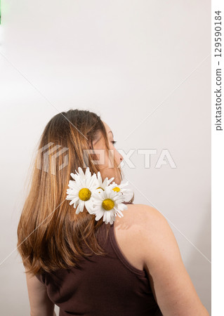Exploring the Beauty of Femininity Through Floral Expression and Natural Elegance Exploring the Beauty of Femininity Through Floral Expression and Natural Elegance 129590184