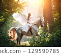 Horse and angel illuminated by the setting sun 129590785