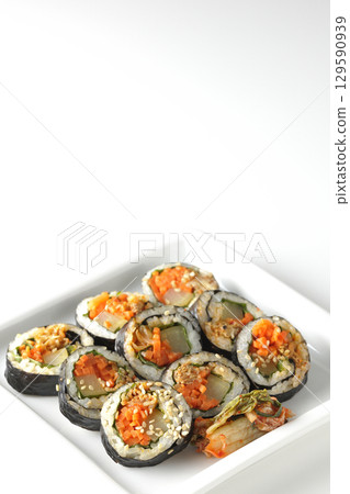 Korean-style seaweed roll kimbap photographed on white background 129590939