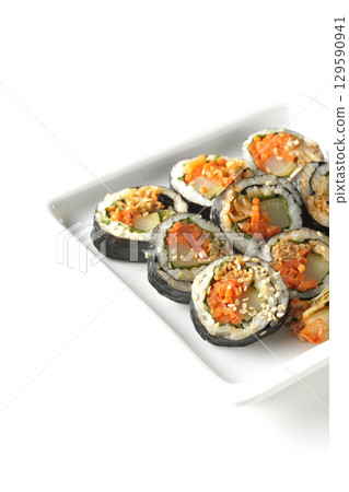 Korean-style seaweed roll kimbap photographed on white background 129590941