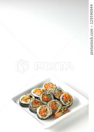 Korean-style seaweed roll kimbap photographed on white background Korean-style seaweed roll kimbap photographed on white background 129590944