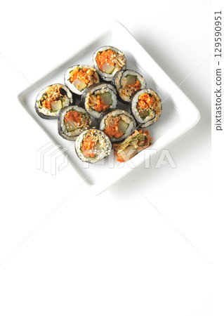 Korean-style seaweed roll kimbap photographed on white background Korean-style seaweed roll kimbap photographed on white background 129590951