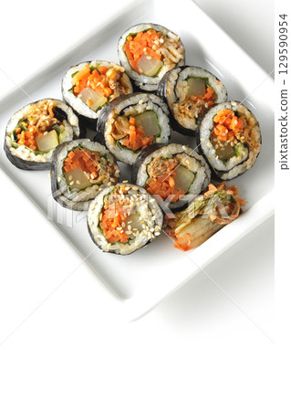 Korean-style seaweed roll kimbap photographed on white background 129590954