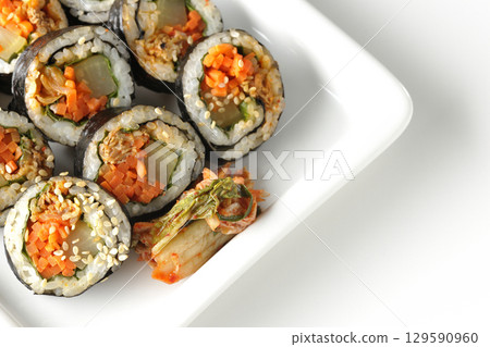 Korean-style seaweed roll kimbap photographed on white background 129590960