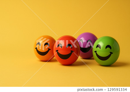 Trio of smiling spheres in distinct colors representing harmony between diversity, inclusion, and equity principles Trio of smiling spheres in distinct colors representing harmony between diversity, inclusion, and equity principles 129591334
