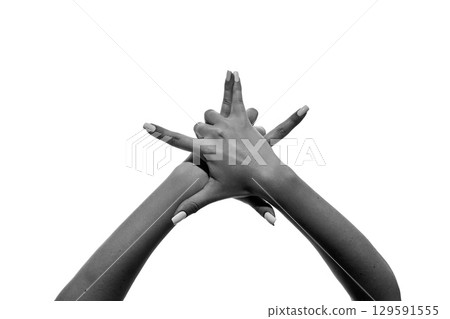 Two hands intertwined with fingers extended upward isolated on white 129591555