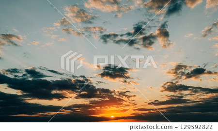 Dramatic sunset with golden 129592822