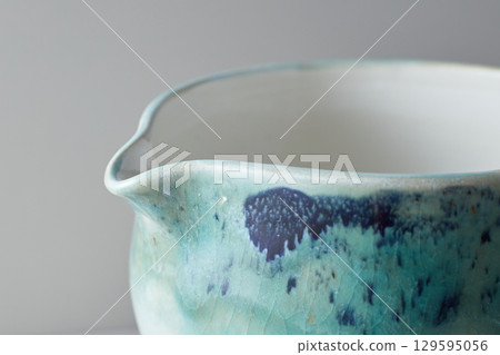 Tea bowl ceramic on gray background. 129595056