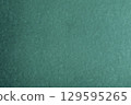 Dark green paper backdrop with noise paper 129595265