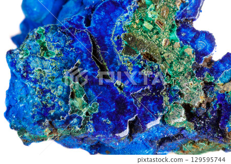 Macro mineral stone malachite with azurite on white background Macro mineral stone malachite with azurite on white background 129595744