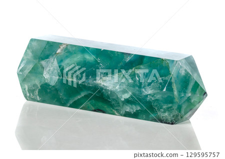 Macro mineral stone Fluorite crystal on a black background Macro mineral stone Fluorite crystal on a black background 129595757