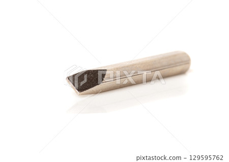 A set of different attachments for a head screwdriver with a screwdriver on a white background A set of different attachments for a head screwdriver with a screwdriver on a white background 129595762