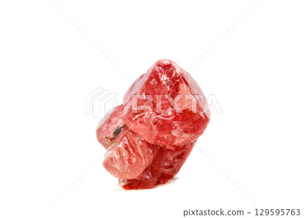 Macro mineral spinel stone on white background Macro mineral spinel stone on white background 129595763