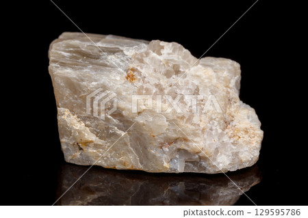 Macro mineral stone Moonstone a black background 129595786