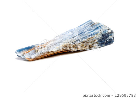 Macro mineral stone Kyanite a white background Macro mineral stone Kyanite a white background 129595788