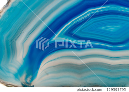 Macro mineral stone Blue Agate breed a white background 129595795