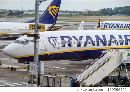 Ryanair Irish ultra low-cost airline airplanes on the tarmac of Brussels South Charleroi Airport in Charleroi, Belgium Ryanair Irish ultra low-cost airline airplanes on the tarmac of Brussels South Charleroi Airport in Charleroi, Belgium 129596331