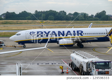Ryanair Irish ultra low-cost airline airplane on the tarmac of Brussels South Charleroi Airport in Charleroi, Belgium Ryanair Irish ultra low-cost airline airplane on the tarmac of Brussels South Charleroi Airport in Charleroi, Belgium 129596333