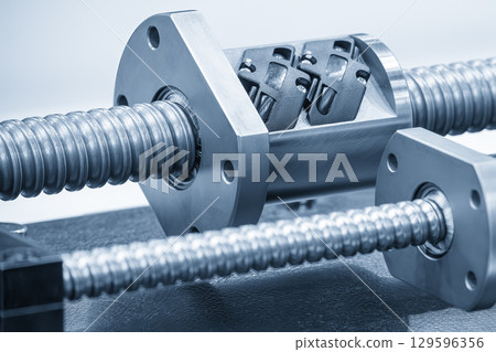Closeup scene the group spare parts lead ball screw set in the light blue scene. Closeup scene the group spare parts lead ball screw set in the light blue scene. 129596356