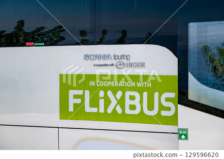A close-up of a Scania bus with the FlixBus logo, popular German company that offers low cost intercity transportation 129596620