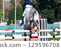 Show Jumping Horse Rider Jump Flight Rear Action 129596708