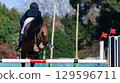 Show Jumping Horse Rider Jump Flight Rear Action 129596711