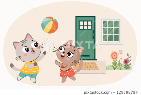 happy adorable two cats playing with ball 129598787