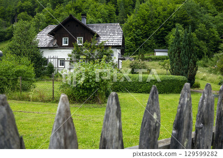 Hallstatt, Austria - June 17, 2023: View of houses in Hallstatt, Austria Hallstatt, Austria - June 17, 2023: View of houses in Hallstatt, Austria 129599282
