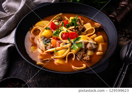 Lagman with beef and vegetables Lagman with beef and vegetables 129599623