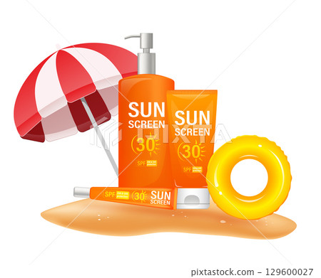 Sunscreen bottles, tube, beach umbrella and inflatable ring standing on sand 129600027