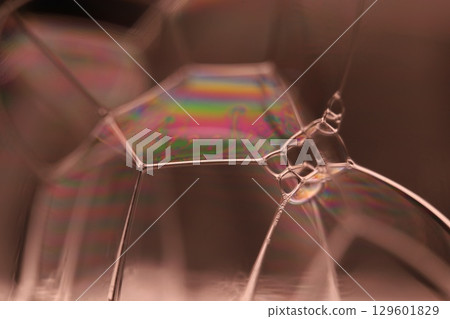 Green liquid film, fantastic bubbles connections, fluid movement, dark fantastic background, transparent oil, green ink 129601829