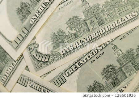 one hundred genuine American dollars series from 1990 to 2006, old dollars in face value of 100, closeup one hundred genuine American dollars series from 1990 to 2006, old dollars in face value of 100, closeup 129601926