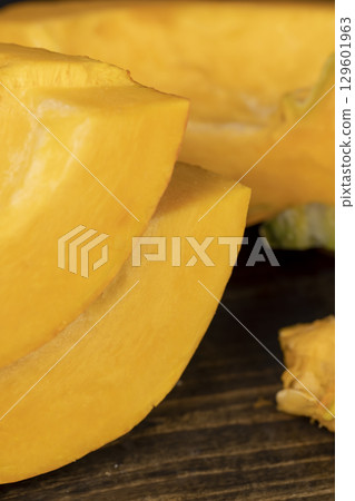 pumpkin with sweet flesh and white seeds, the fruit of a large pumpkin for baking, close up pumpkin with sweet flesh and white seeds, the fruit of a large pumpkin for baking, close up 129601963