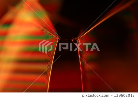 Orange coloured liquid surface, fluid effect, bright chemistry, geometric shapes Orange coloured liquid surface, fluid effect, bright chemistry, geometric shapes 129602012