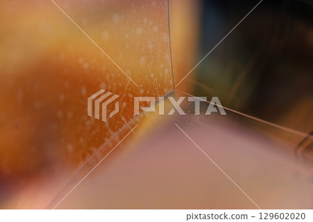 Orange coloured liquid surface, fluid effect, bright chemistry, geometric shapes 129602020