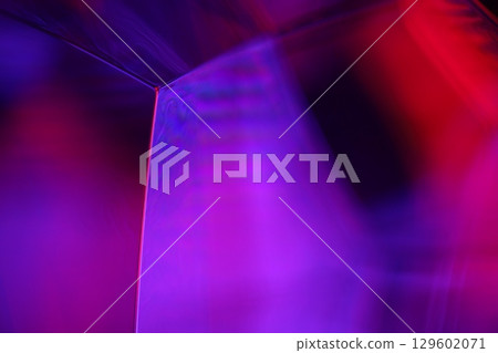 Purple liquid edge on black background 129602071