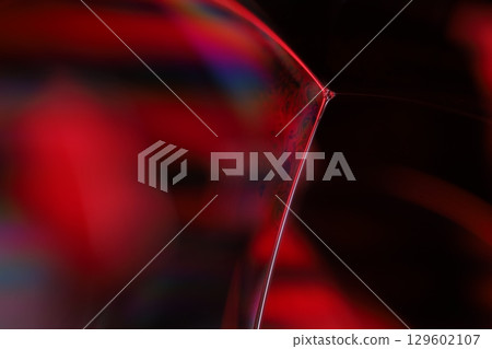Red reflections of liquid in macro, red liquid surface, bubbles in macro, connection of bubbles in macro, cell from liquid, horror background, glossy surface panels Red reflections of liquid in macro, red liquid surface, bubbles in macro, connection of bubbles in macro, cell from liquid, horror background, glossy surface panels 129602107