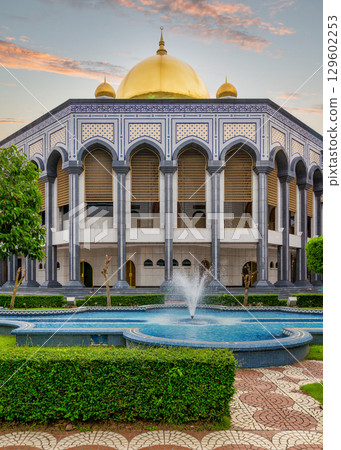 ame' Asr Hassanil Bolkiah Mosque with golden domes and fountain at dusk, Bandar Seri Begawan, Brunei 129602253