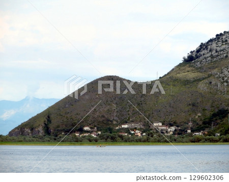 Exploring the Tranquil Beauty of Skadar Lake and Its Charming Town in Montenegro Exploring the Tranquil Beauty of Skadar Lake and Its Charming Town in Montenegro 129602306