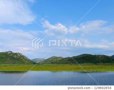 Explore the Breathtaking Beauty of Skadar Lake in Montenegro During a Serene Afternoon 129602658