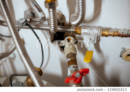 Worn Pipes and Valves in a Home Water System 129602813