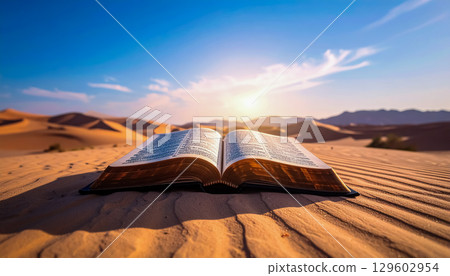 沙漠中一本打開的書和日落/一幅令人嘆為觀止的風景，喚起時間與智慧的流逝 129602954