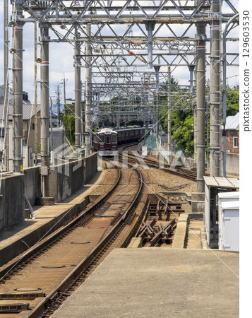 A local train bound for Hibarigaoka Hanayashiki leaving Kawanishi-Noseguchi Station A local train bound for Hibarigaoka Hanayashiki leaving Kawanishi-Noseguchi Station 129603530