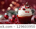 Festive Holiday Cupcake with Frosting and Decorations 129603950