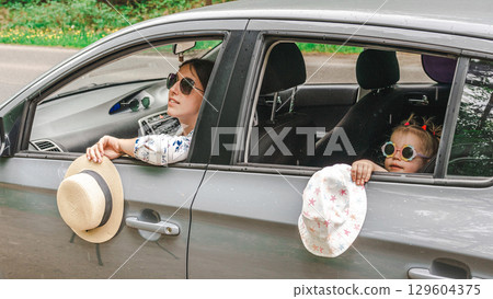 Car trip. Family vacation road adventure. People grass luggage travel. Car trip. Family vacation road adventure. People grass luggage travel. 129604375